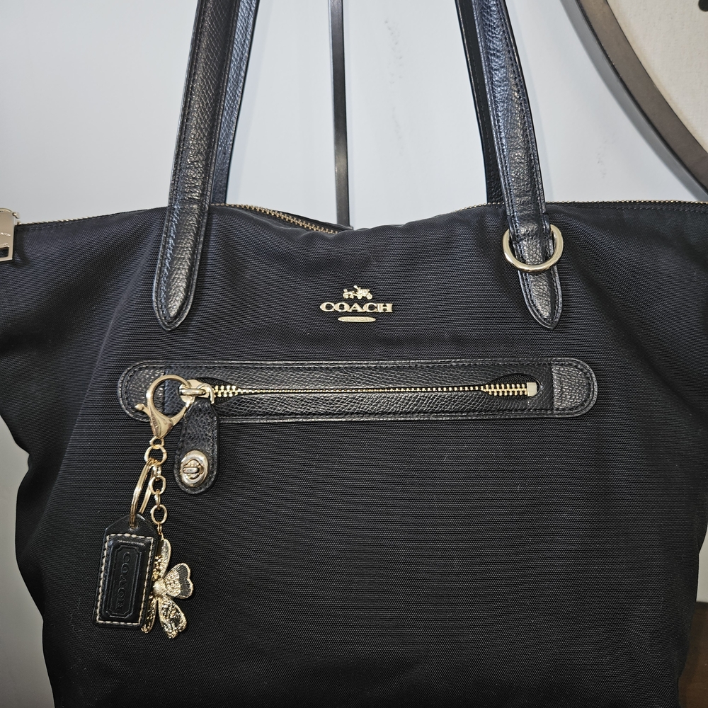 Coach Nylon Zip Tote with light gold hardware and a turnlock detail
